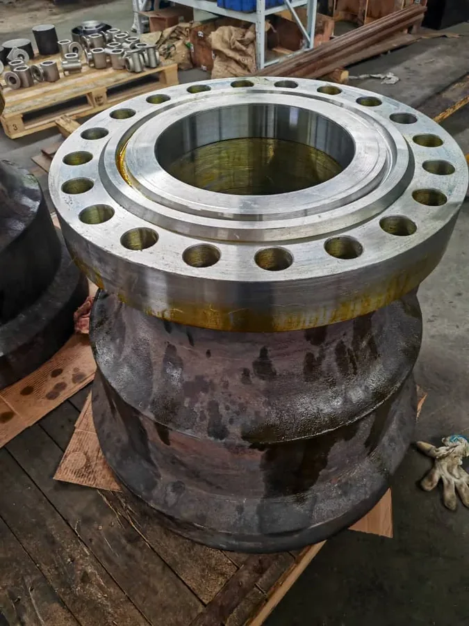 Large bearing housing on the workshop floor after machining